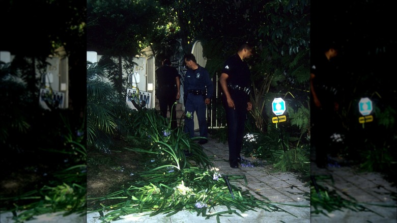 Investigators searching crime scene