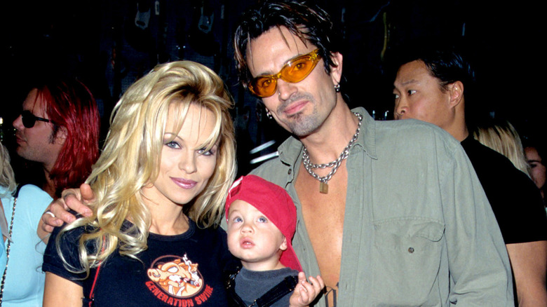 Pamela Anderson and Tommy Lee pose with baby Brandon