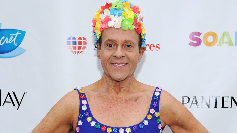 Richard Simmons in flower cap