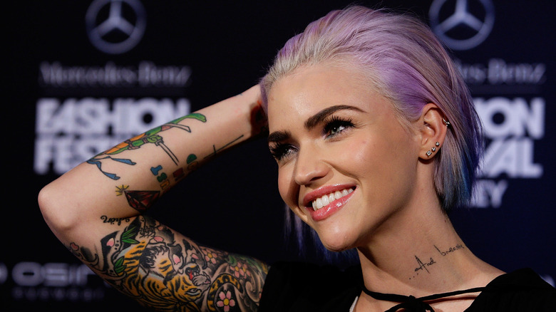 Ruby Rose smiling with purple hair