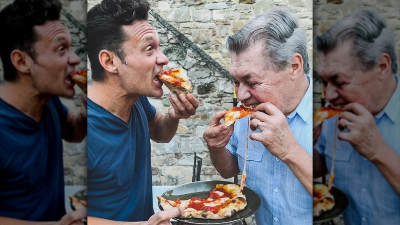 Ryan Seacrest eats pizza with his father