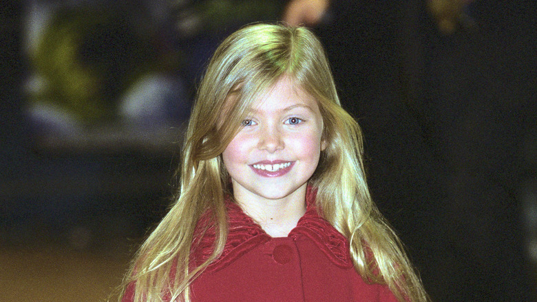 Young Taylor Momsen smiling