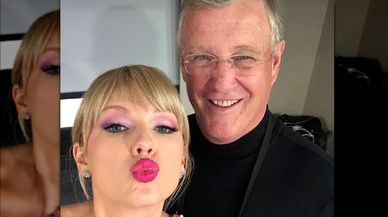 Taylor and Scott Swift pose together