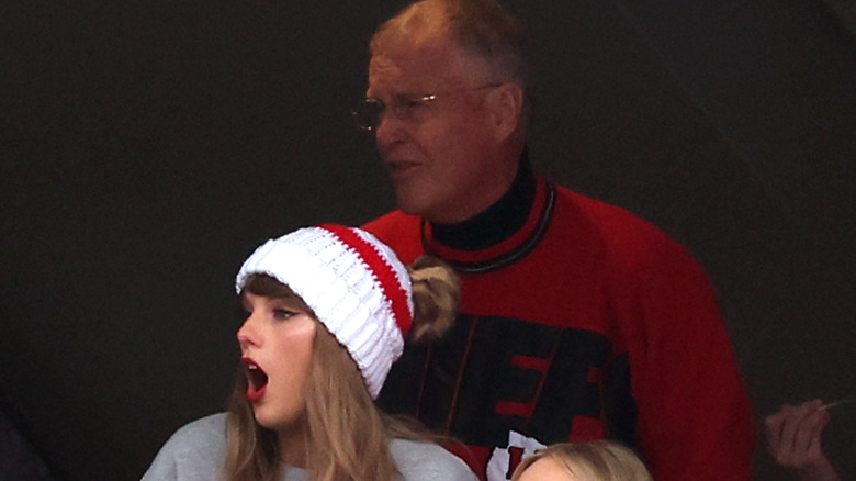 Scott and Taylor Swift watching a football game