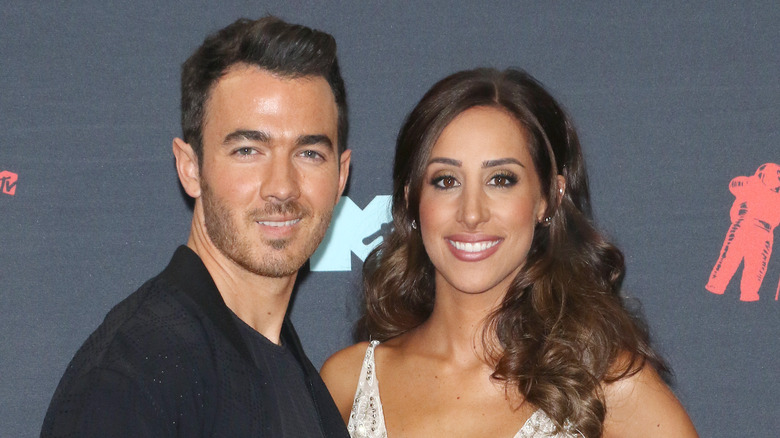 Kevin and Danielle Jonas pose together