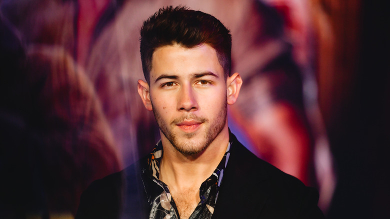 Nick Jonas posing