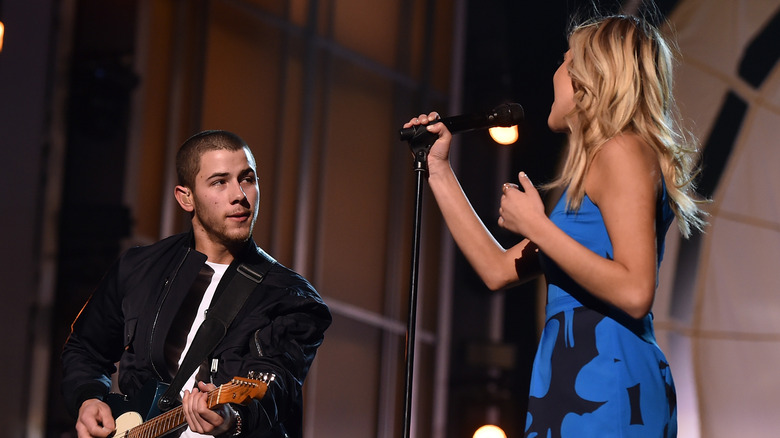 Nick Jonas performs with Kelsea Ballerini