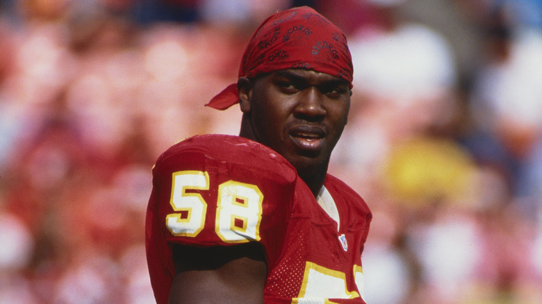 Derrick Thomas looking on 