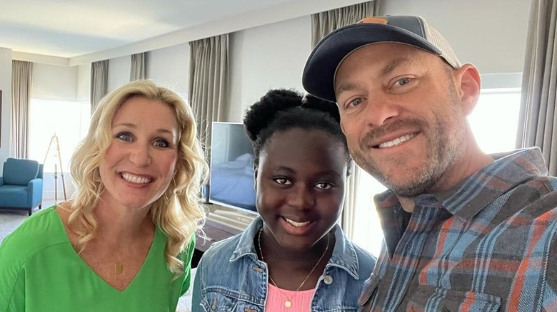 Jenny, Sylvie, and Dave Marrs smiling selfie