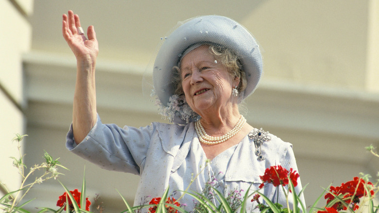 The Queen Mother waving