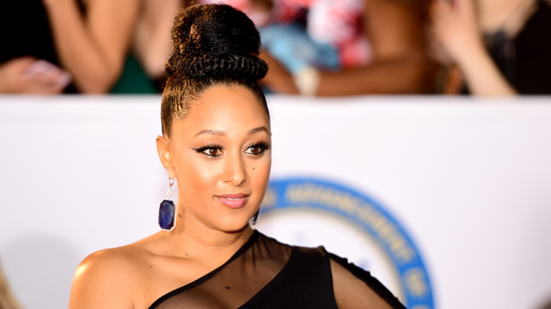 Tamera Mowry posing