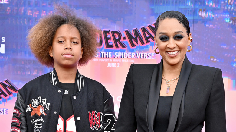 Tia Mowry and son posing