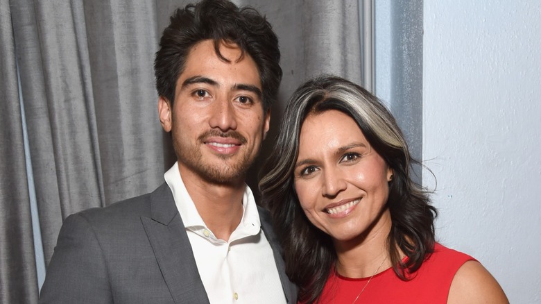 Tulsi Gabbard posing with her husband, Abraham Williams.