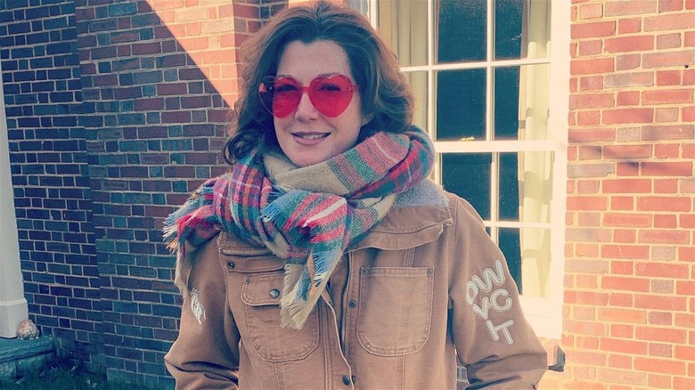 Amy Grant wearing sunglasses