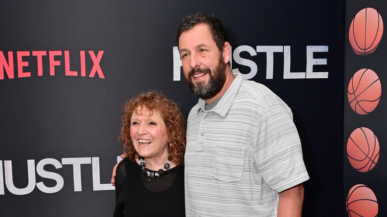 Judy and Adam Sandler pose together