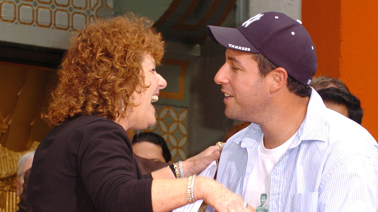 Judy Sandler hugging Adam Sandler