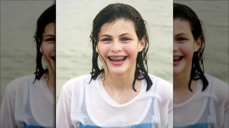 Alexandra Daddario in the ocean as a child