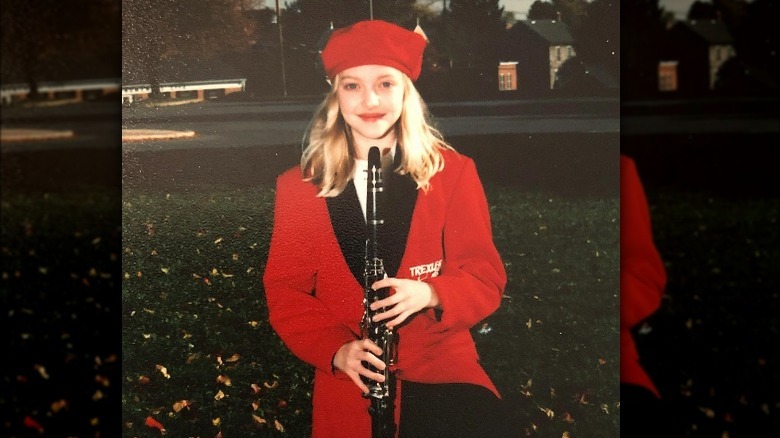 Young Amanda Seyfried with clarinet