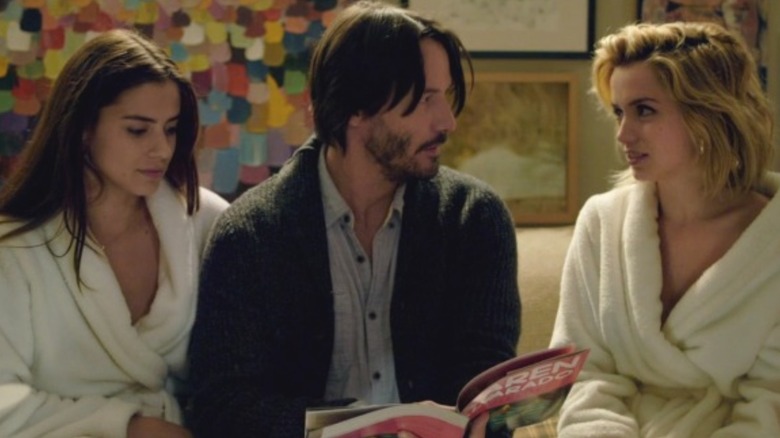 Lorenza Izzo, Keanu Reeves, and Ana de Armas in "Knock Knock"