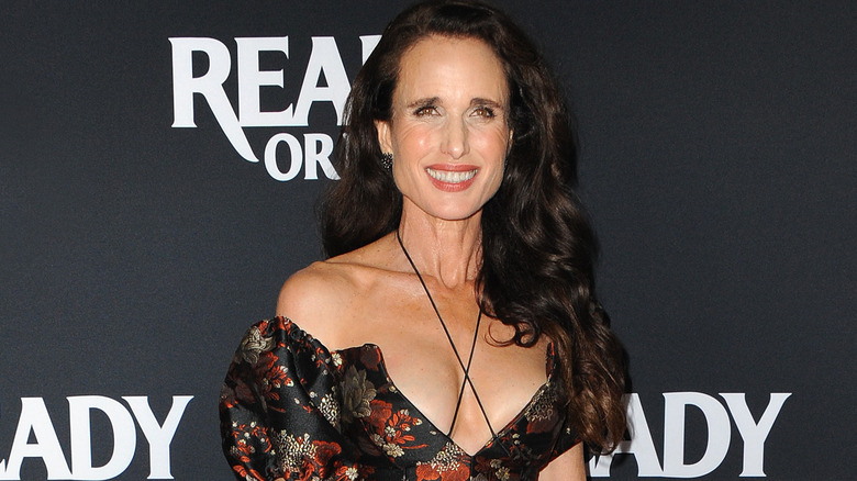Andie MacDowell peace sign at Ready or Not premiere