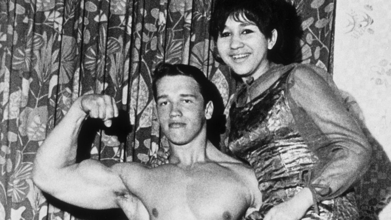 A young Arnold Schwarzenegger flexes