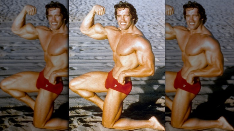 Arnold Schwarzenegger flexing on the beach