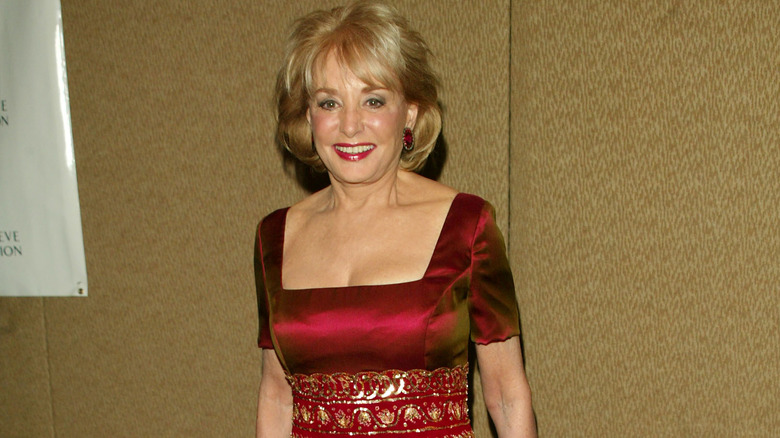 Barbara Walters wearing red