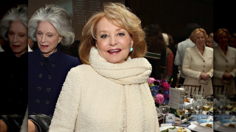 Barbara Walters wearing white coat