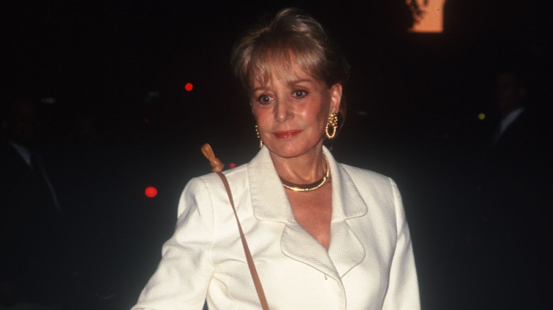 Barbara Walters wearing gold jewelry