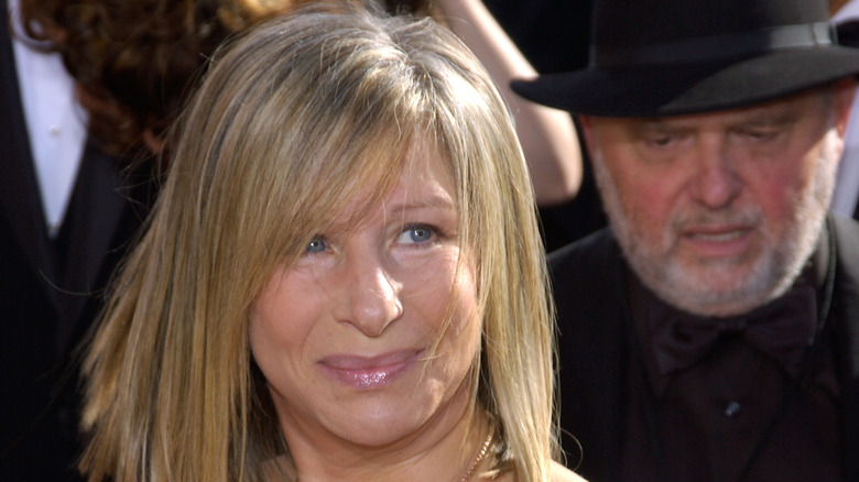 Barbra Streisand on the red carpet, smiling