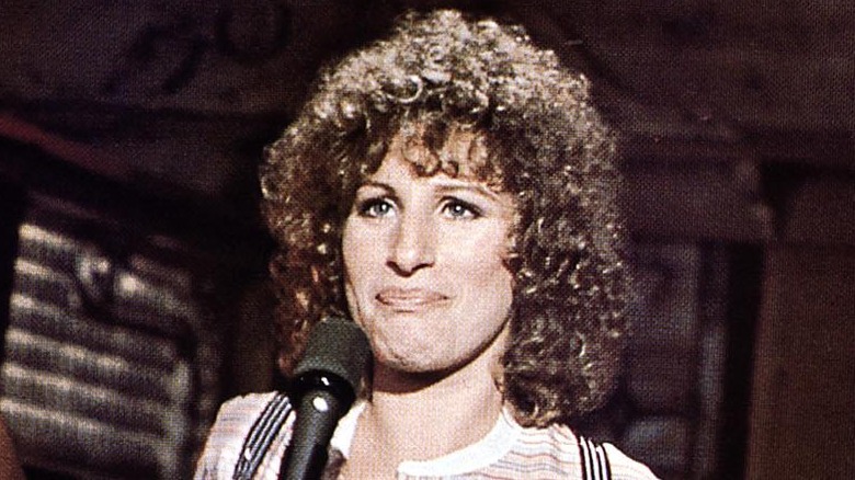 Barbra Streisand singing with curly hair