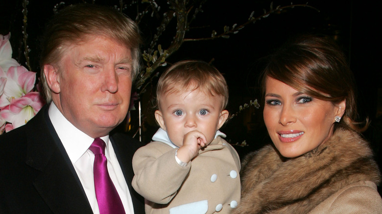 Donald, Melania Trump posing with Barron