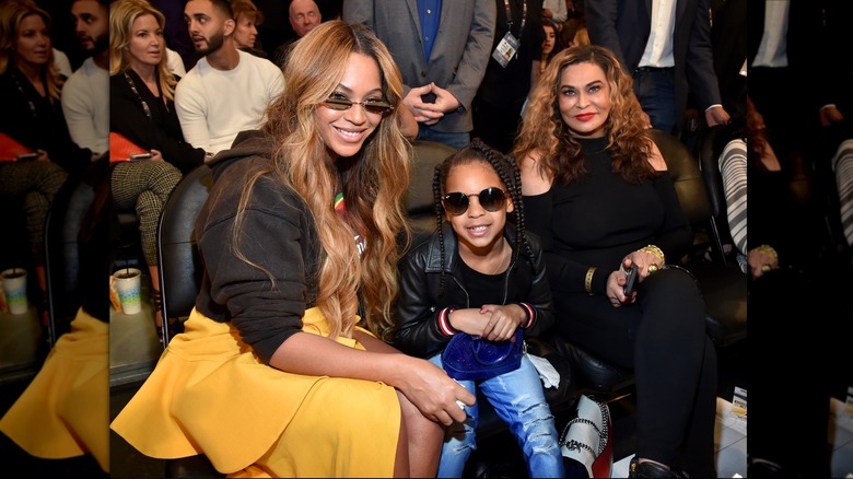 Blue Ivy Carter poses with  Beyoncé and Tina Knowles