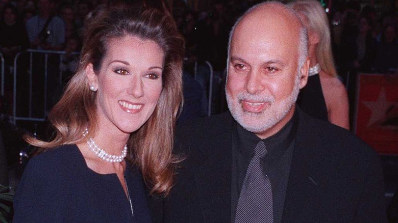 Celine Dion and Rene Angelil smiling at Titanic premiere