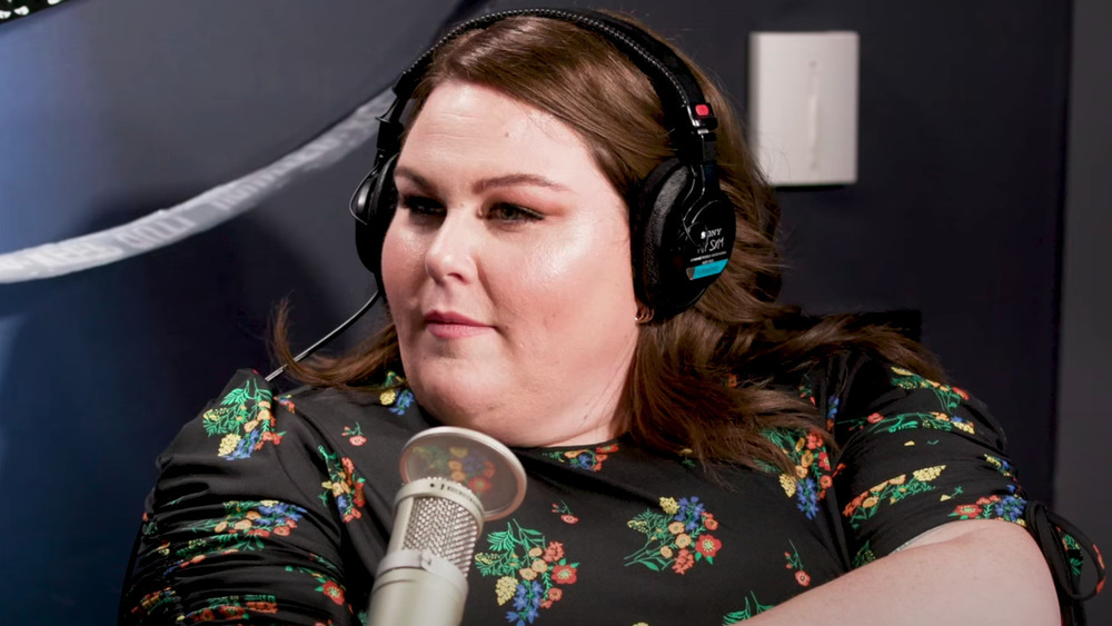 Chrissy Metz at the microphone for a radio interview 