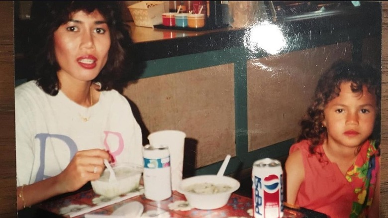 Chrissy Teigen as a child with mom