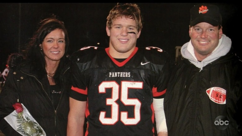 teen Colton Underwood in football uniform with mom Donna and dad Scott