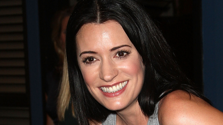 Paget Brewster smiles at a party