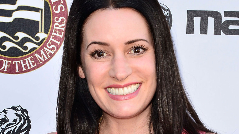 Paget Brewster smiles on the red carpet