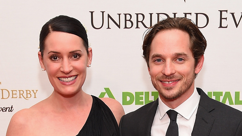 Paget Brewster and Steve Damstra pose on the red carpet