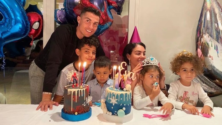 Cristiano Ronaldo, his girlfriend and his four children singing happy birthday.