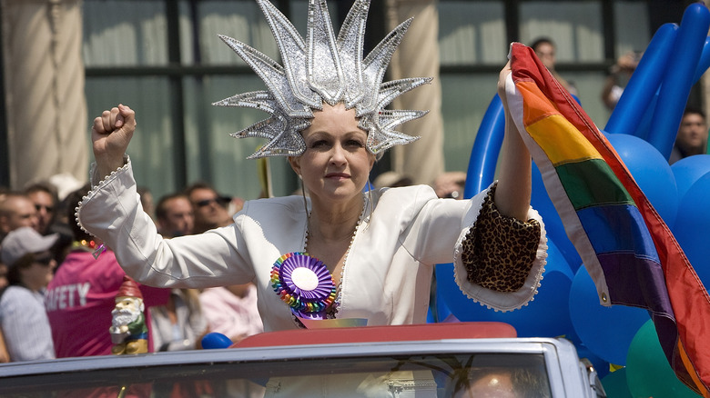 Cyndi Lauper waving Pride flag