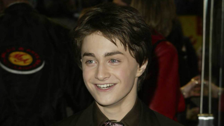 Daniel Radcliffe in a dark suit in 2002.