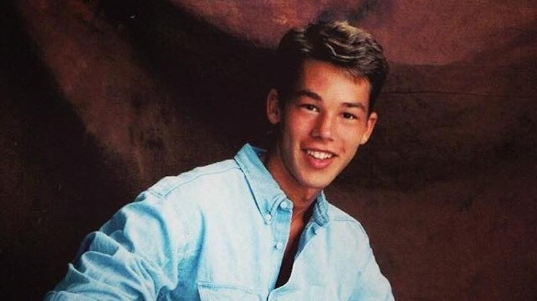 Young David Bromstad smiling