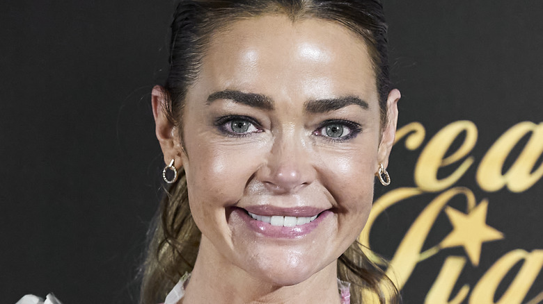 Denise Richards poses with makeup