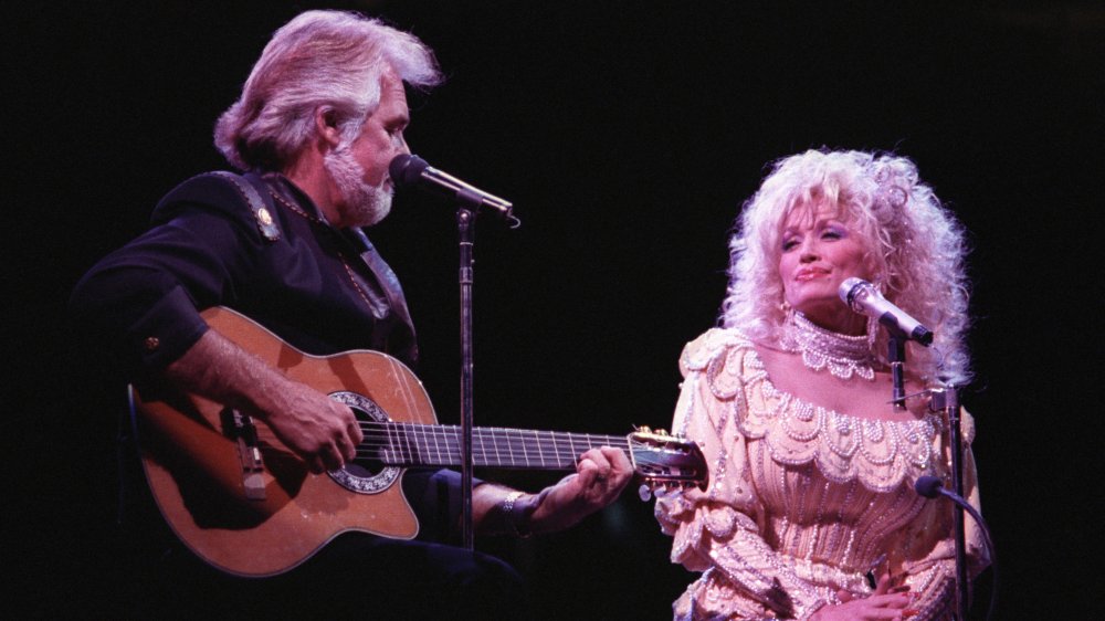 Kenny Rogers, Dolly Parton performing in 1990 at age 44