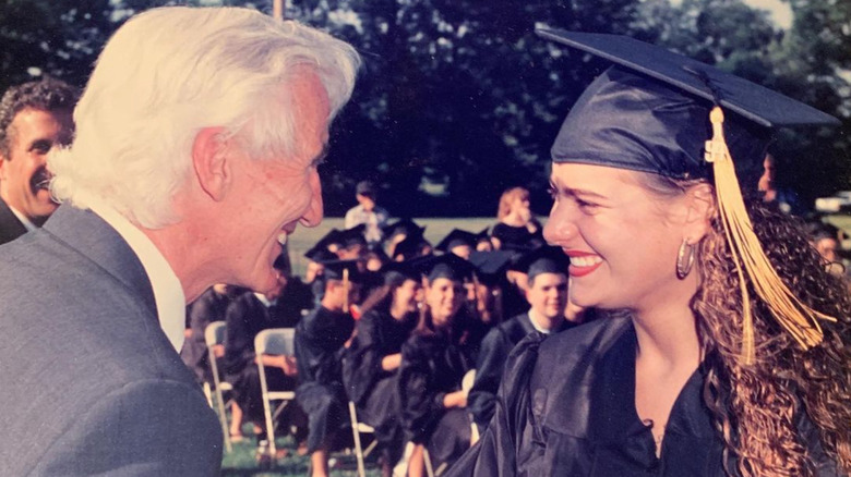Dorit Lemel smiling on her high school graduation day June 1994