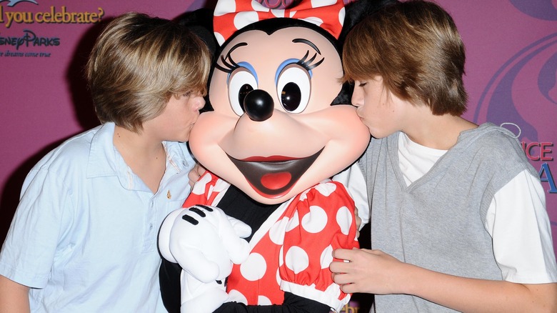 Sprouse brothers kissing Minnie Mouse