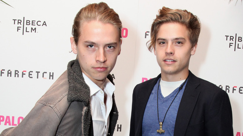 Dylan and Cole Sprouse looking at camera