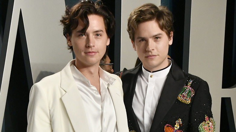 Cole and Dylan Sprouse looking at camera